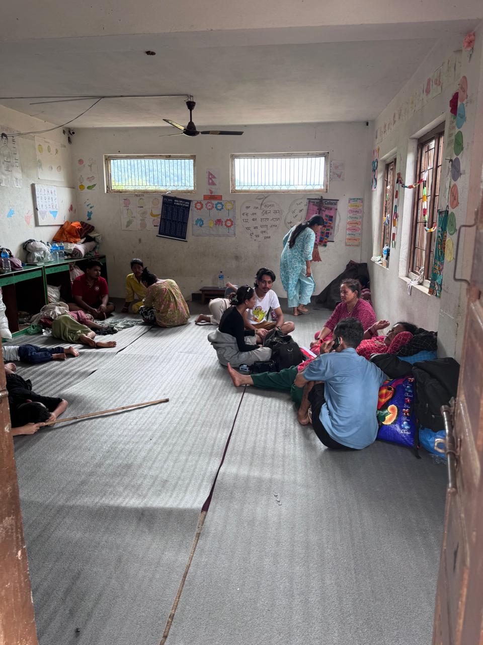 Family sheltering in classroom