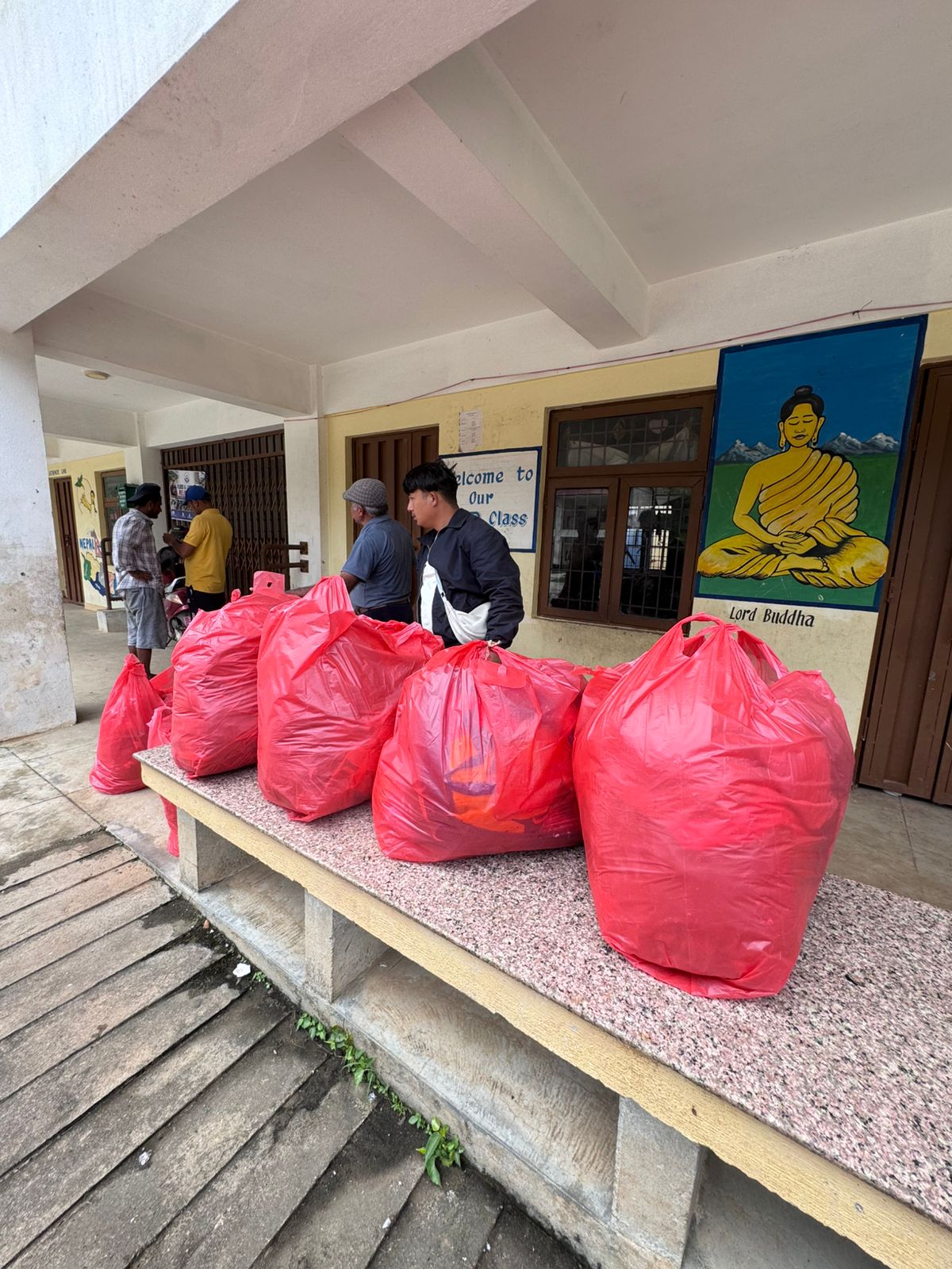 Bagged relief supplies staged at the school for distribution.